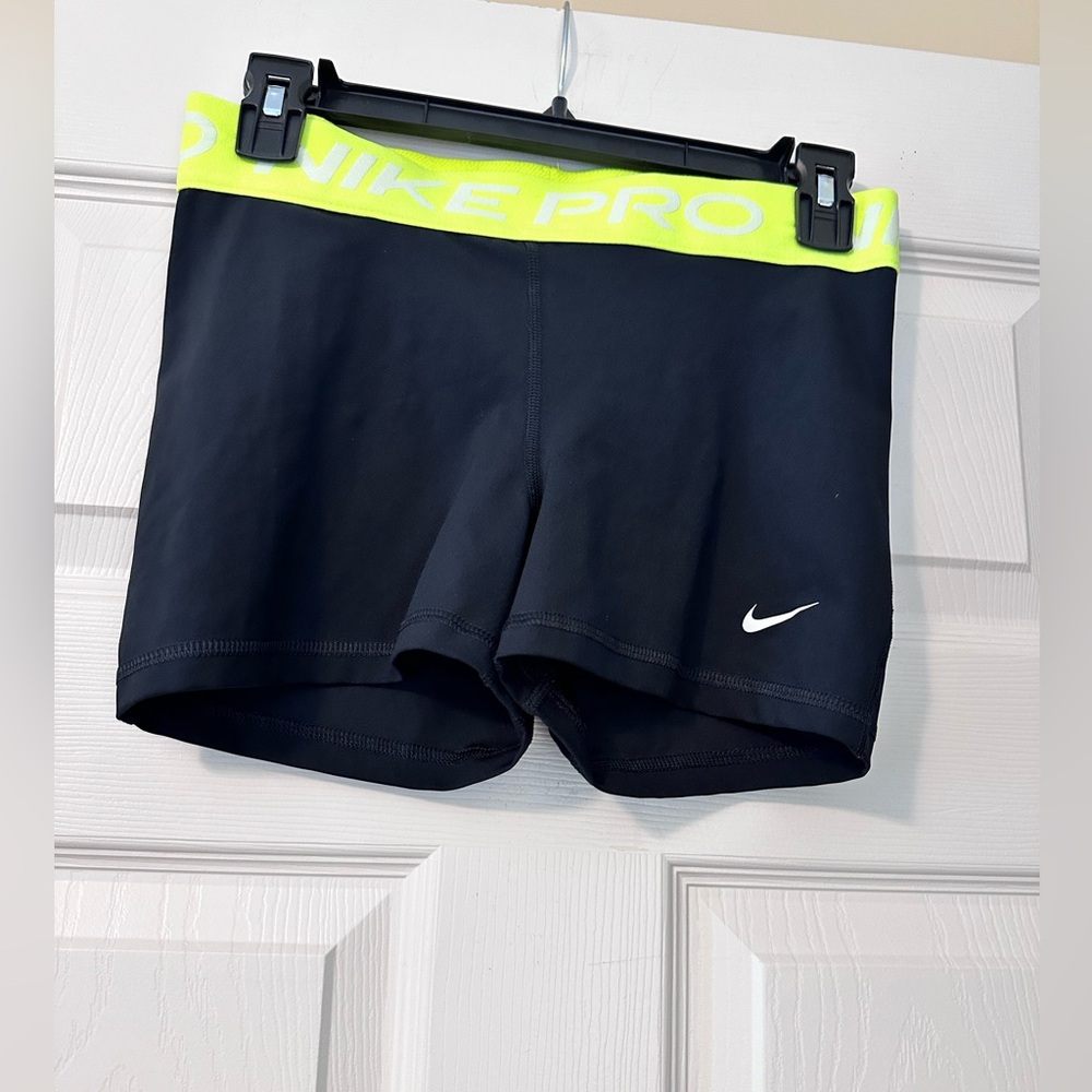 Nike Pro 3” Dri Fit shorts Size Medium Color Back highlighter yellow waistband
